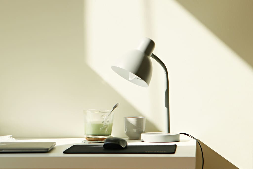 A close view of a clear desk surface in soft natural light.